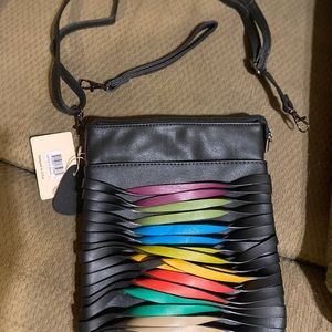 Cute black purse/crossbody! Multi colors in the front. New with tags.
